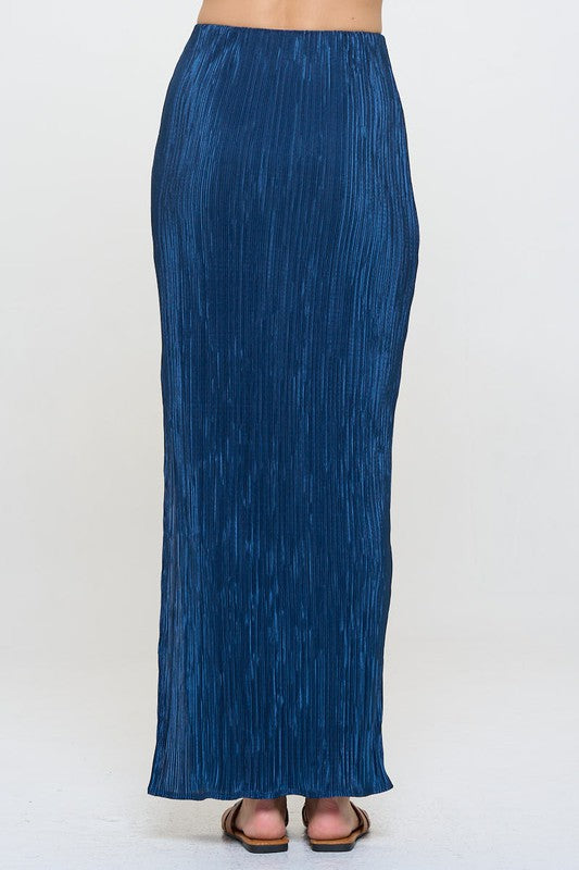 Back view of pleated slit skirt on model