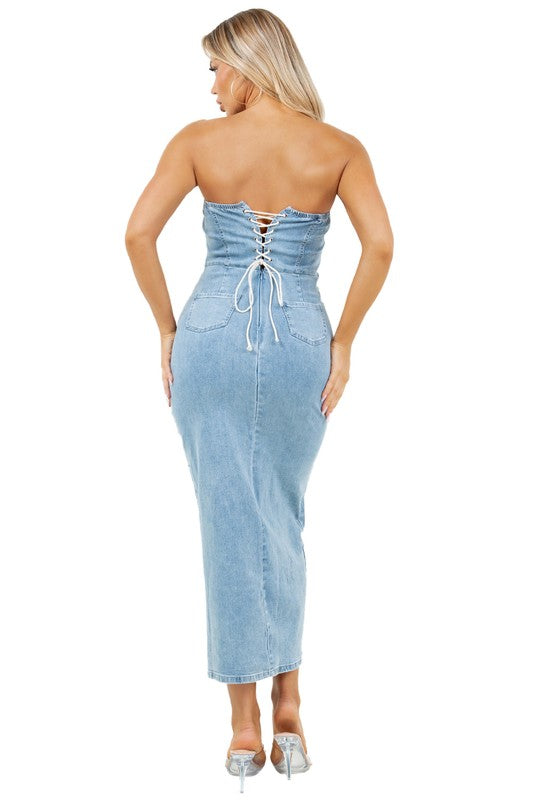Close-up of back strap and zipper details on denim dress