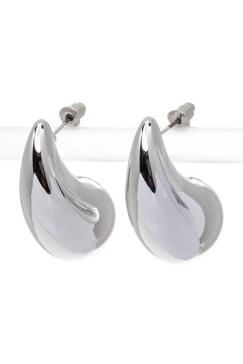 Model wearing Droplet Iconic Earrings with casual outfit
