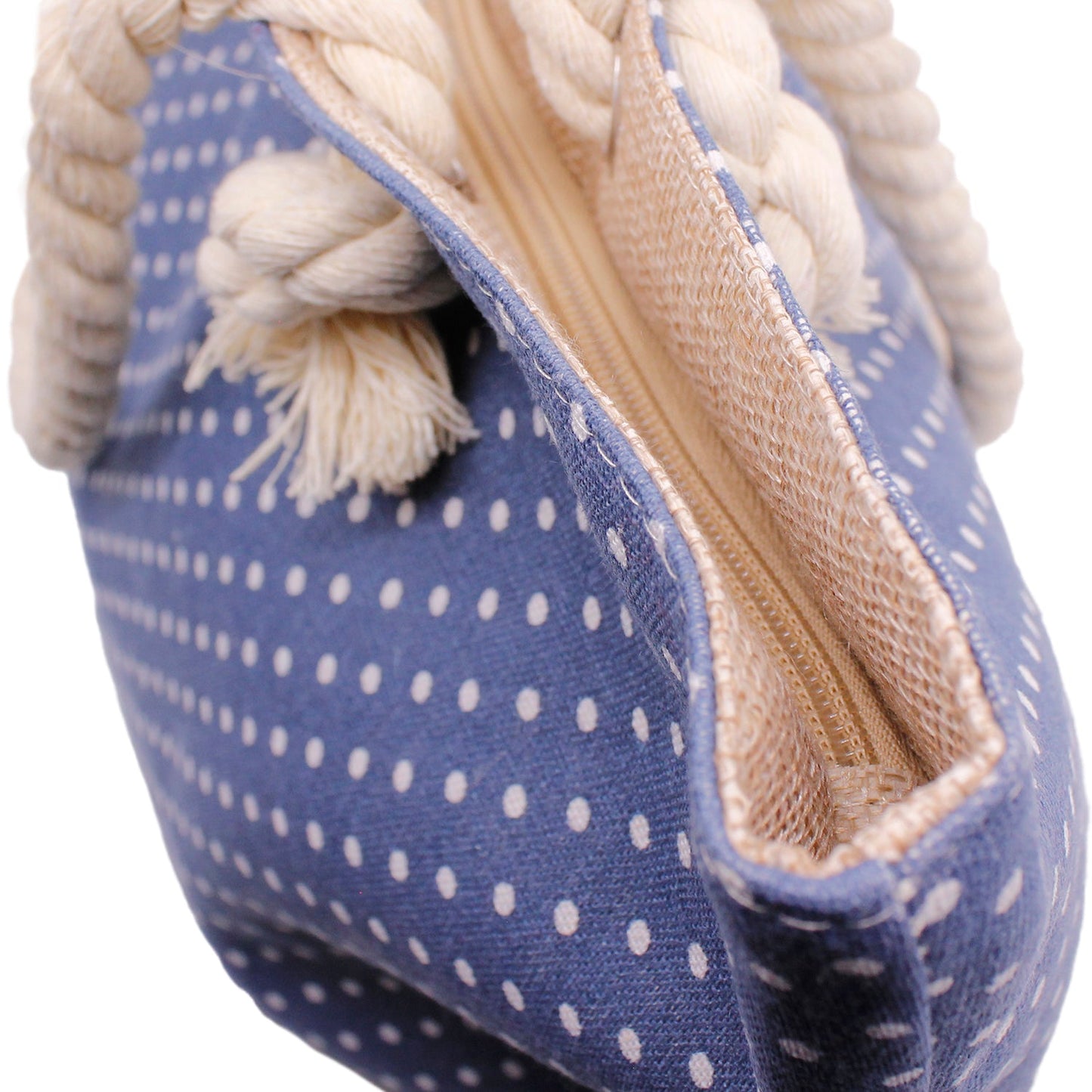 Close-up of polka dot beach bag with nautical rope handles