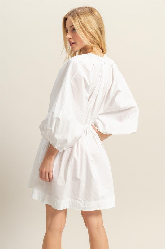 Trendy mini dress with balloon sleeves and flirty fit
