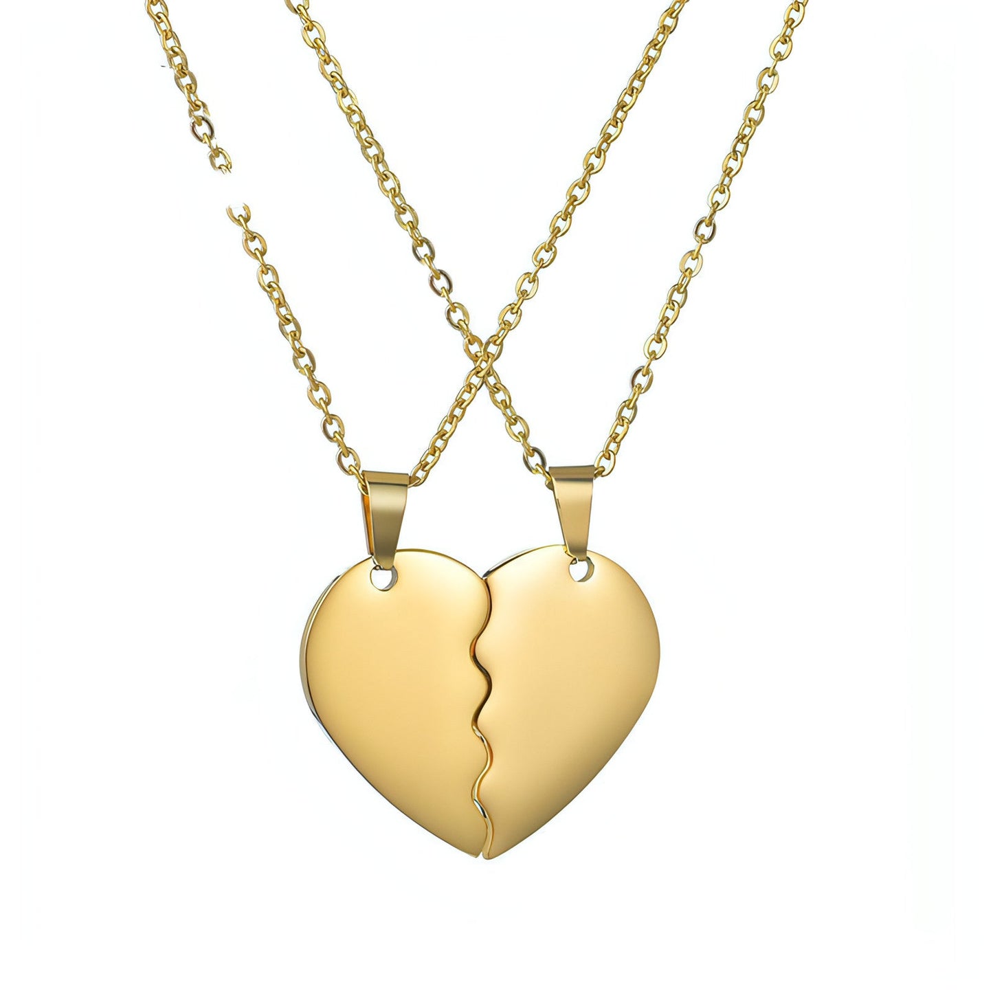 Close-up of engraved heart puzzle necklaces