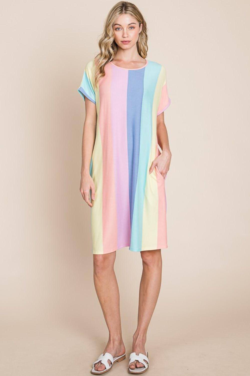 Striped casual day dress styled with sandals and tote