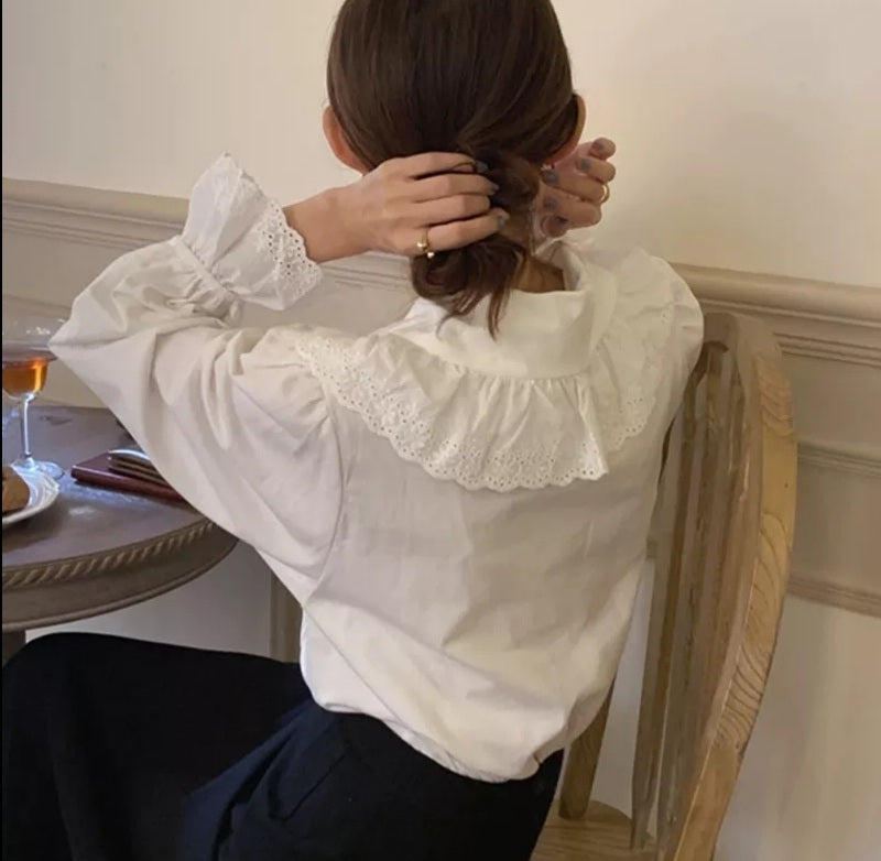 Front view of V-neck Korean-inspired cotton blouse