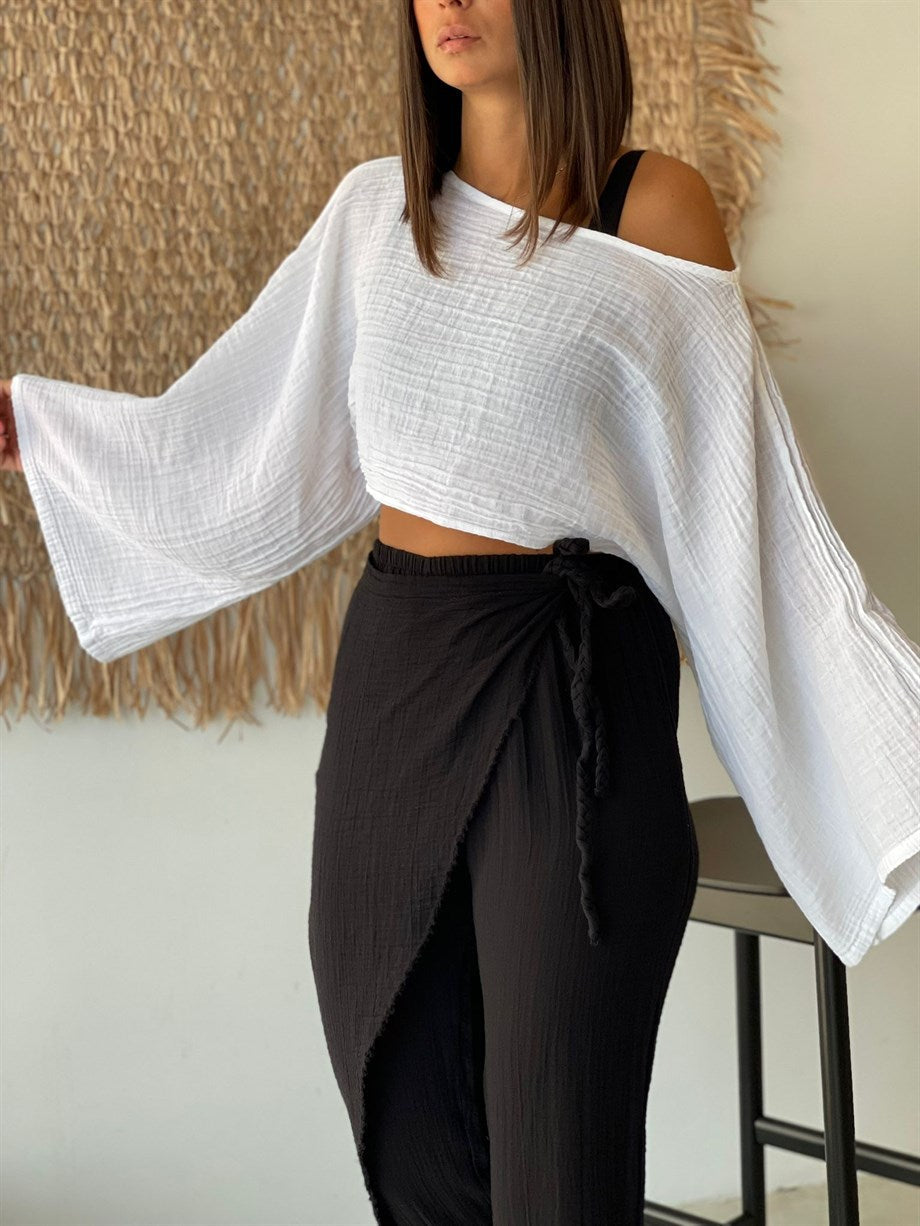 Lightweight sustainable pants styled with a casual top