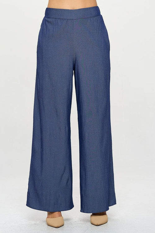 Flat lay of solid color straight leg pants made in the USA