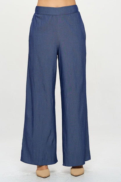 Flat lay of solid color straight leg pants made in the USA