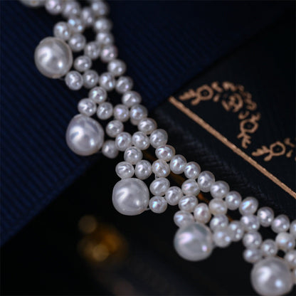 Elegant bridal necklace with multilayer pearls and gold detailing