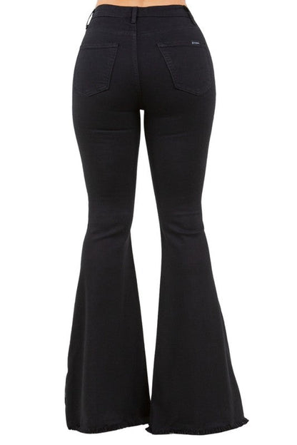 Back view of high-stretch bell bottom jeans with pockets