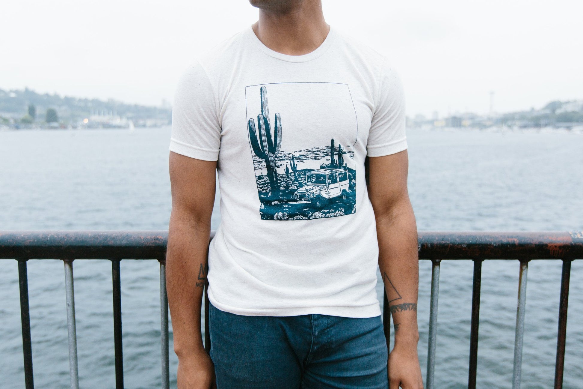 Desert Cruiser oatmeal tee with navy print – unisex tri-blend shirt