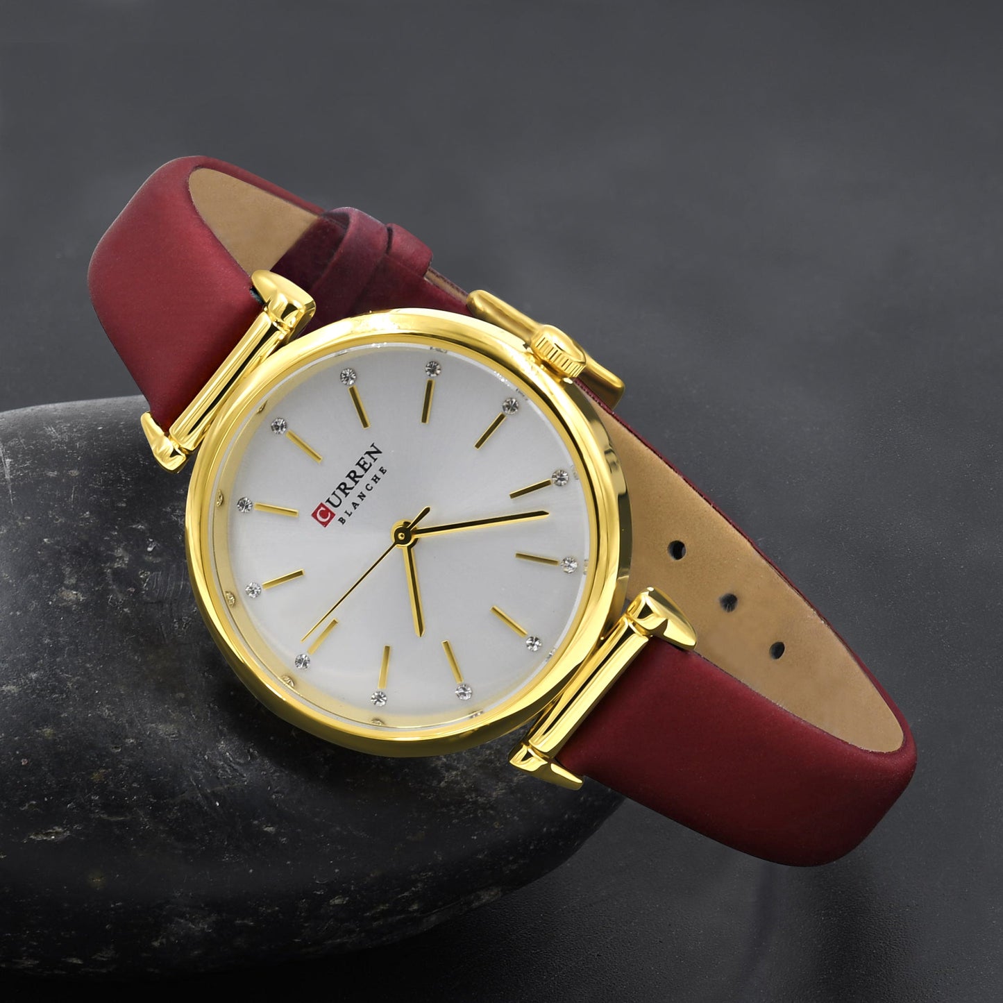 Close-up of AUDIRE Curren women's leather watch with crystal dial