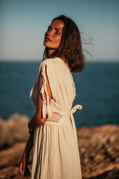 Woman posing in Helen Organic Cotton Goddess Side Slit Dress