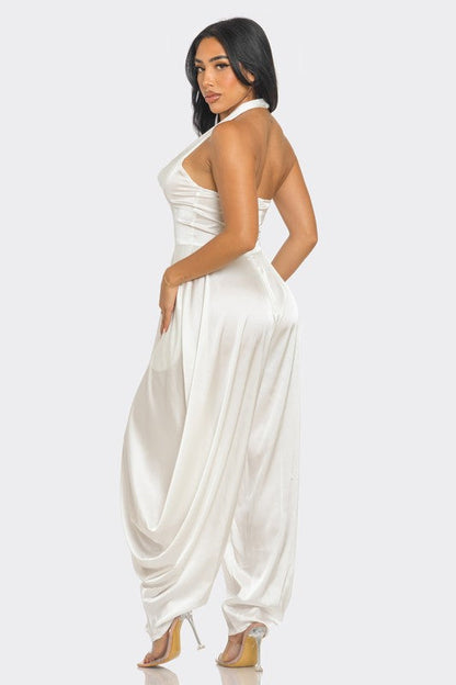 Back view of luxury wide-leg ivory jumpsuit for weddings