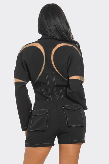 Modern black romper featuring bold mesh inserts and sleek fit
