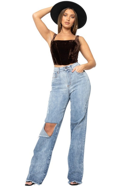 High rise wide leg denim jeans with frayed hem in light wash
