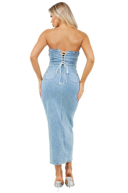 Close-up of back strap and zipper details on denim dress