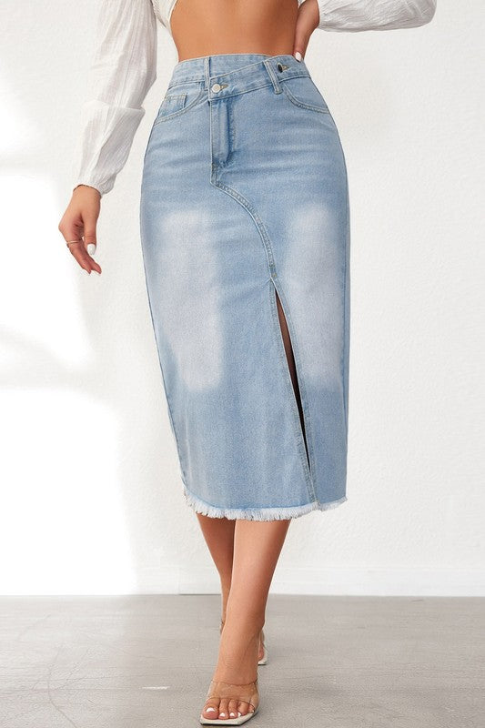 Close-up of two-button and zip fly design on blue denim skirt