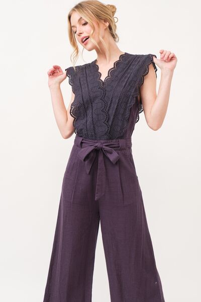 Close-up of lightweight linen-rayon fabric texture of the jumpsuit