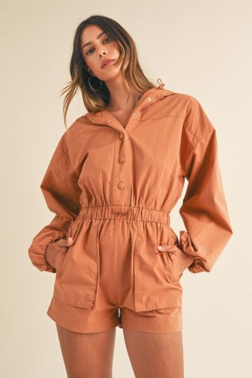 Relaxed fit long sleeve hooded romper with pockets