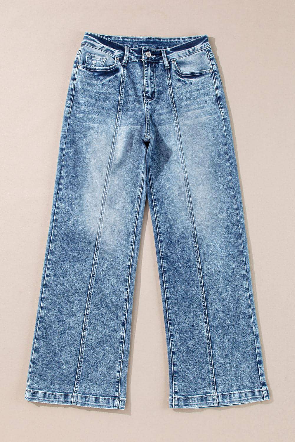 Close-up of central seam detail on fashion denim pants