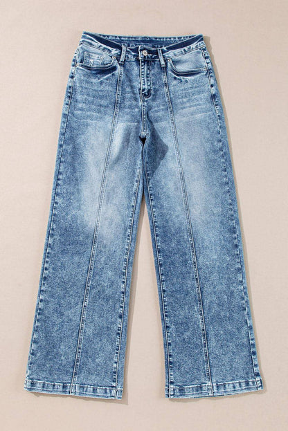 Close-up of central seam detail on fashion denim pants