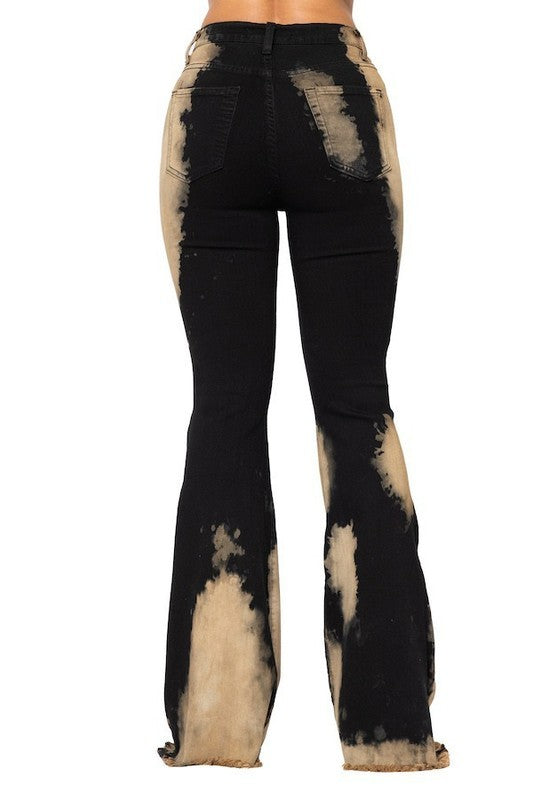 Back view of bleach-dyed bell bottom jeans highlighting rear pockets
