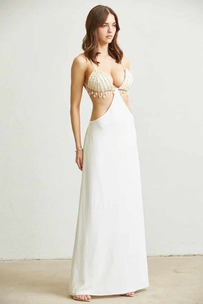 Side view of Shell Cascade Dress showing waist cutouts and silhouette