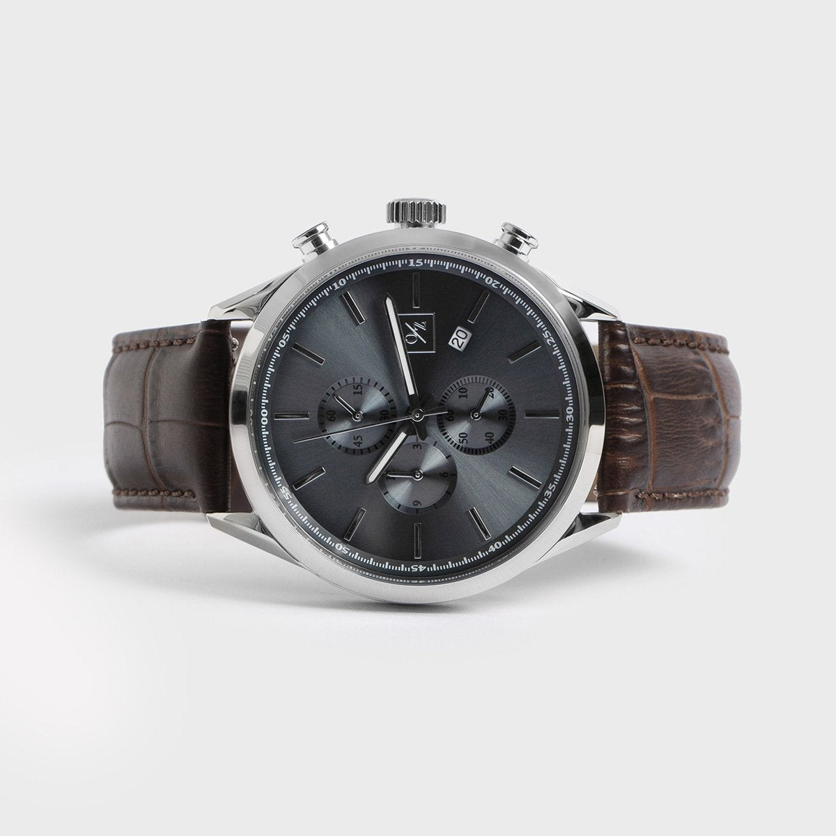 Chronograph leather band watch styled with a suit