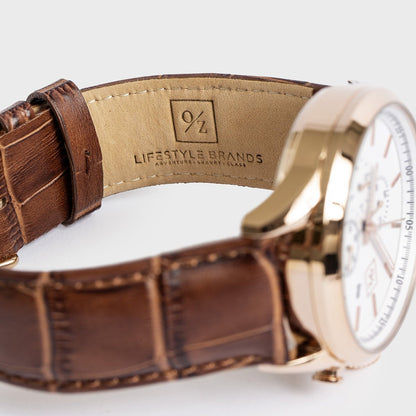 Overstitched leather strap on premium chronograph timepiece
