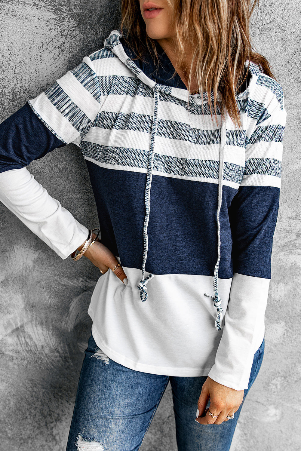 White color block hoodie front view on model