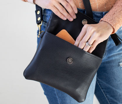 Rustic leather clutch with visible grain and natural texture