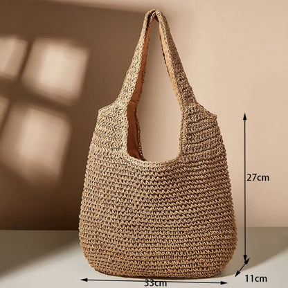 Bohemian straw shoulder tote styled for a summer beach look