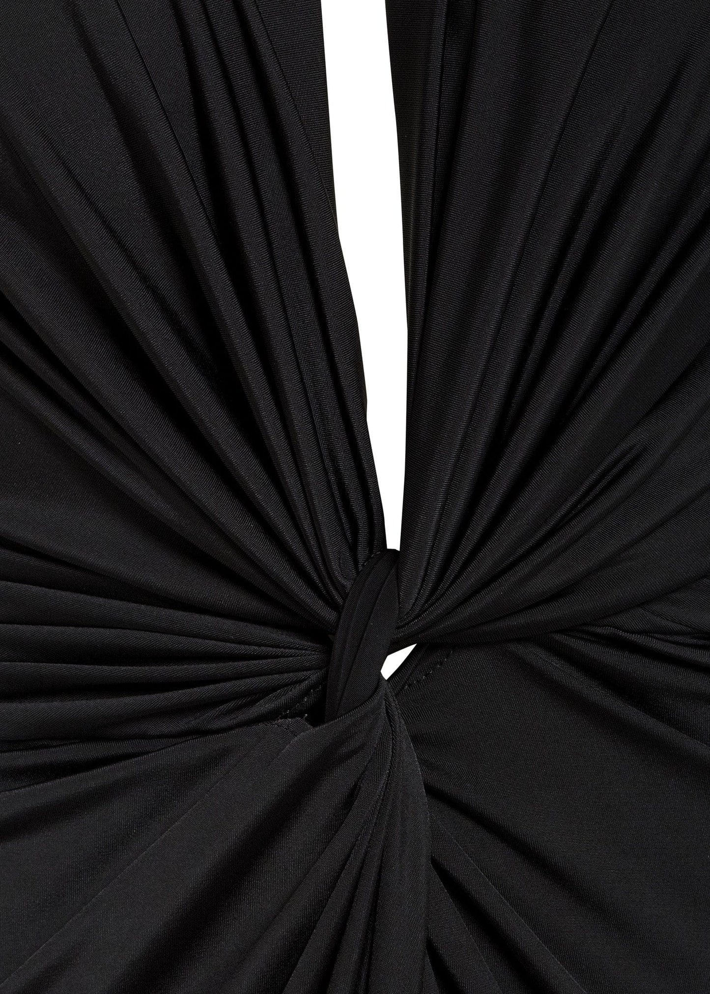 Close-up of knot detail on black midi bodycon dress