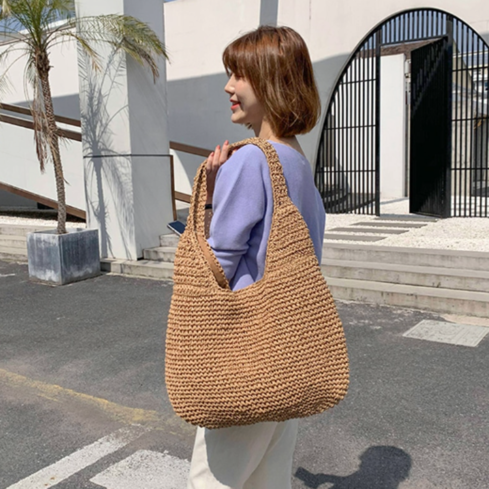 Open-top woven straw bag with hollow design