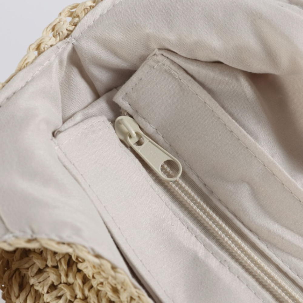 Inside view of spacious straw tote bag with fabric lining