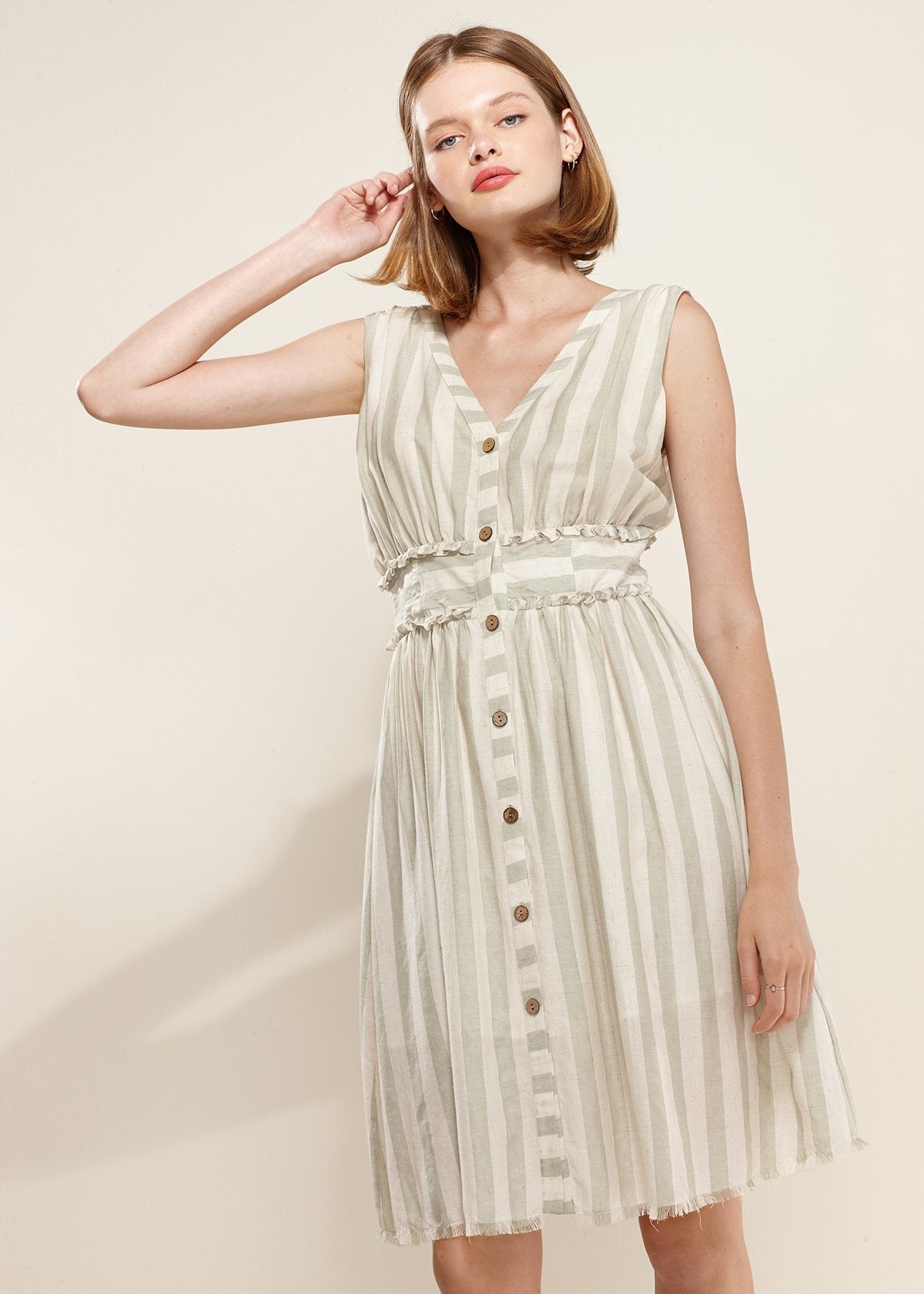 Sage green sleeveless stripe dress – front view