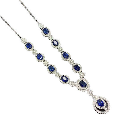 Sterling silver women's necklace with blue gemstone