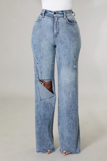 Full-length handcrafted denim pants styled with heels