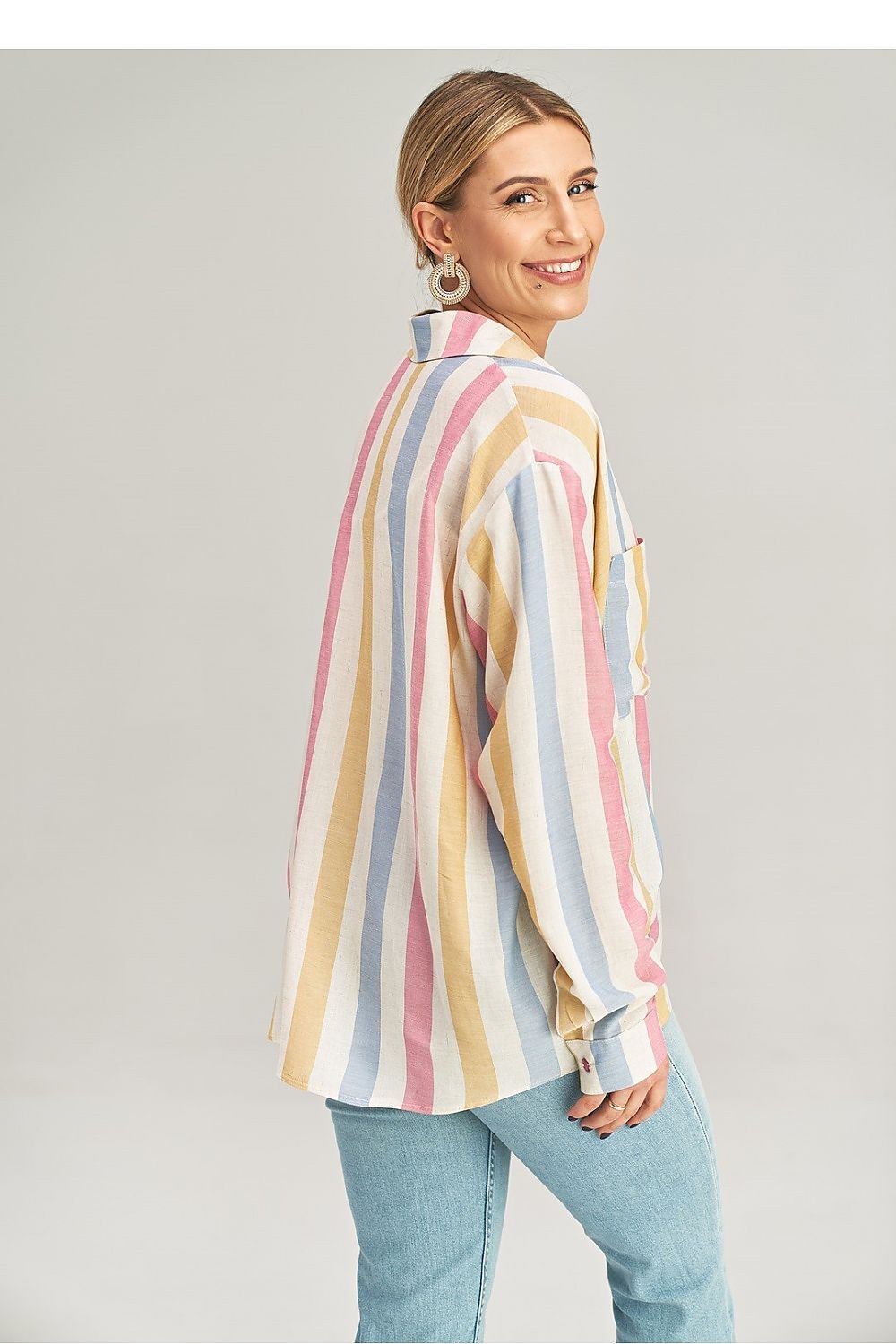 Back view of high-low women’s shirt – relaxed fit with casual elegance