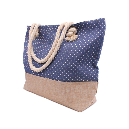 Woman holding polka dot beach bag with summer outfit