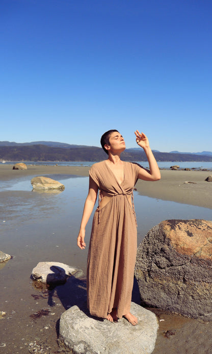 Adjustable one-size natural cotton maxi dress styled for a beach party