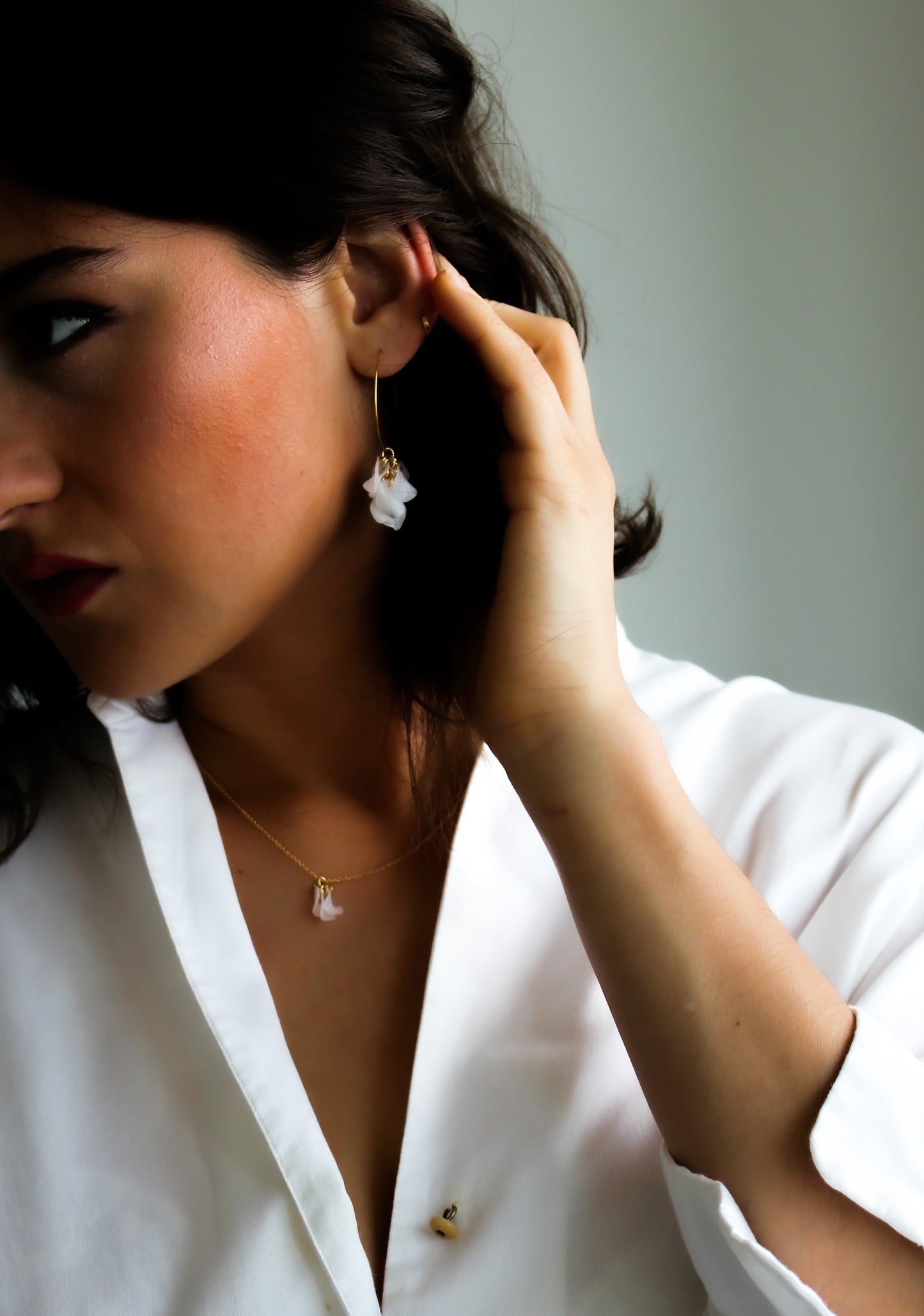 Vita Earrings – elegant white floral charm on gold hoops