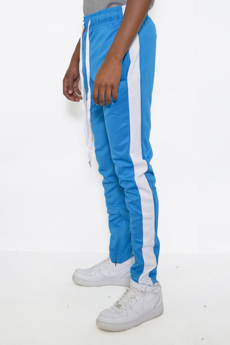 Side view of slim fit track pants with sleek stripe detail