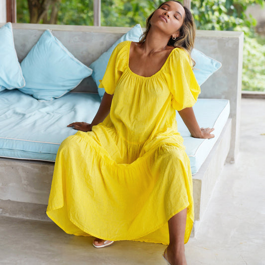 Rosemary dotted cotton dress in sunflower yellow with puff sleeves