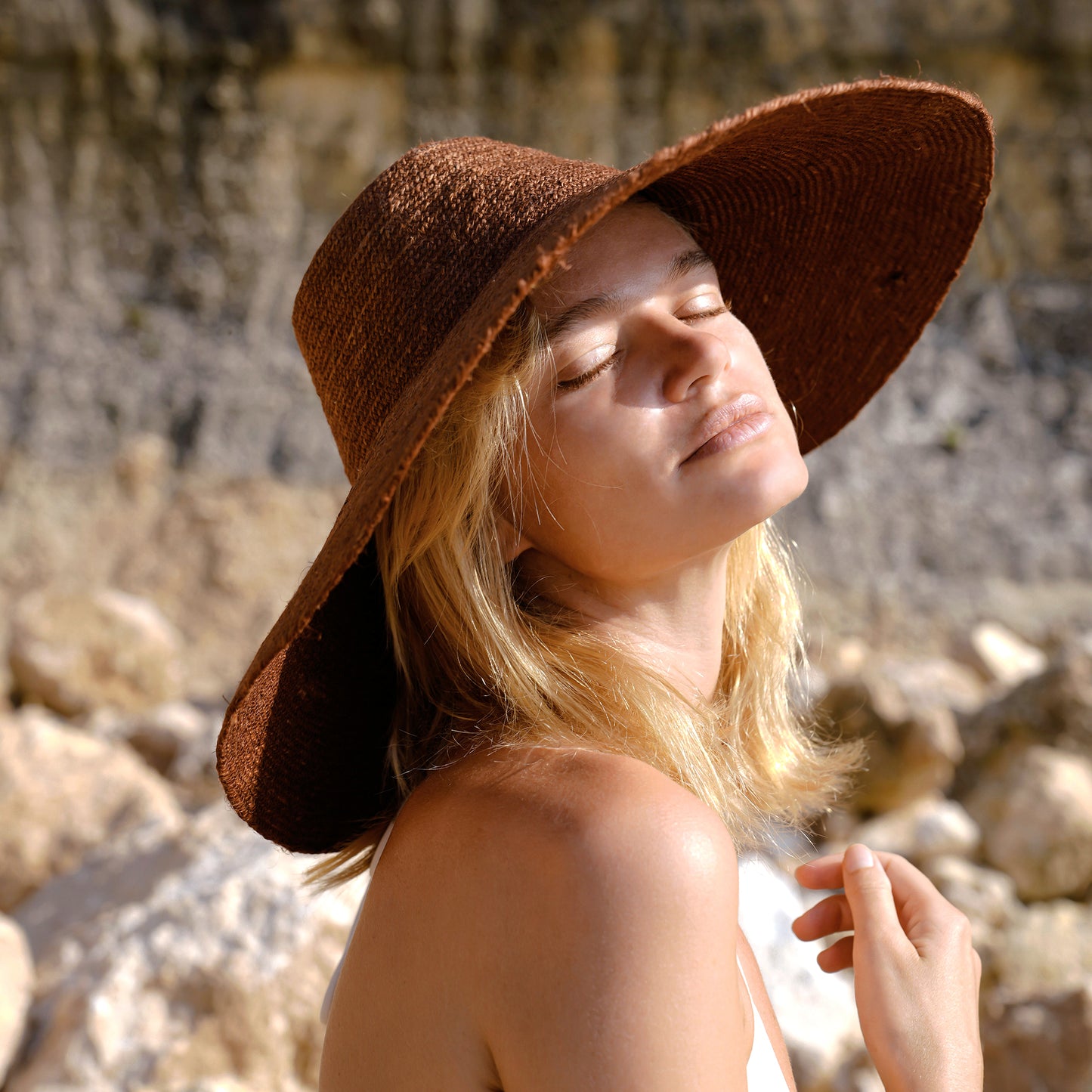 Plant-based biodegradable jute hat styled for vacation look