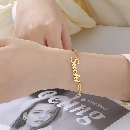Elegant gold square chain bracelet on wrist