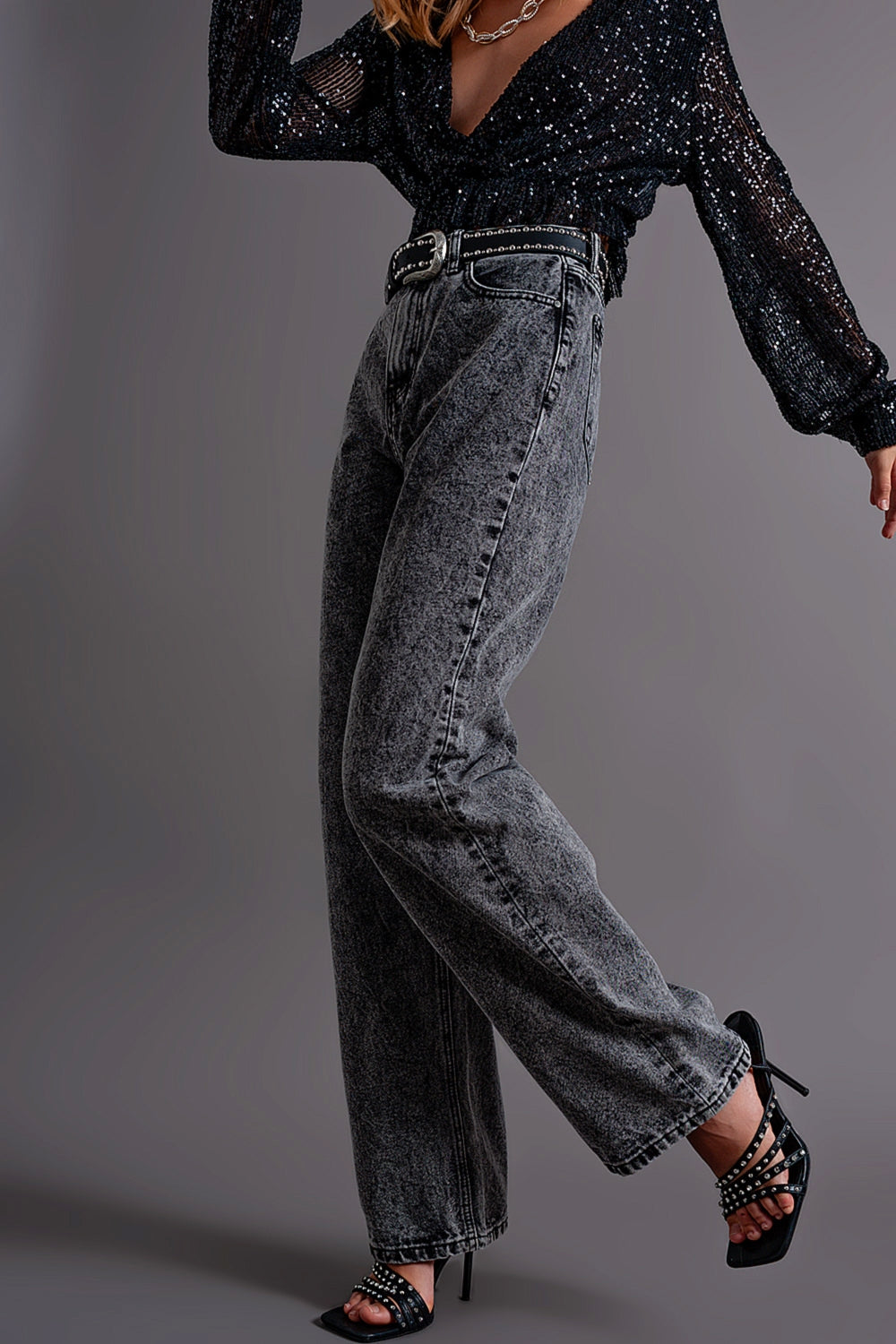 Full-length black mom jeans with belt loops and relaxed hip fit