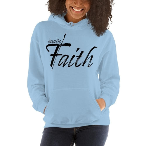 Woman wearing Inspire Faith pullover hoodie with jeans