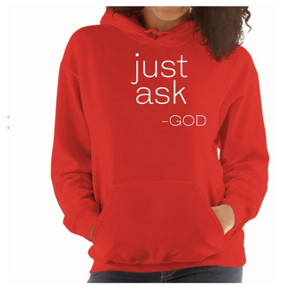 Woman wearing "Just Ask-God" hoodie with hands in pockets